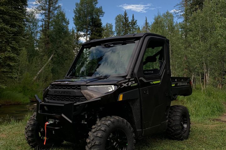 a truck is parked in the grass